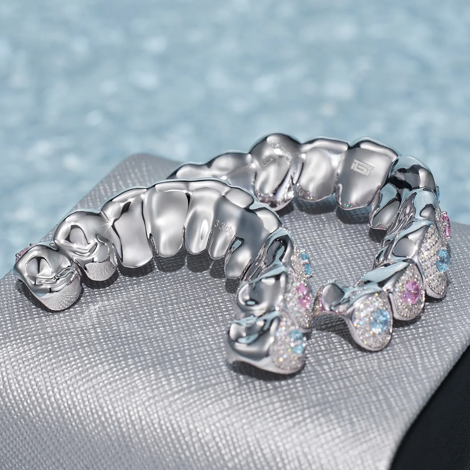 Custom Moissanite With Blue & Red Gemstone Grillz - Image 5